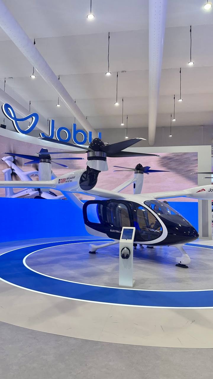 representatives of the Jets & Helicopters company at an exhibition in Dubai